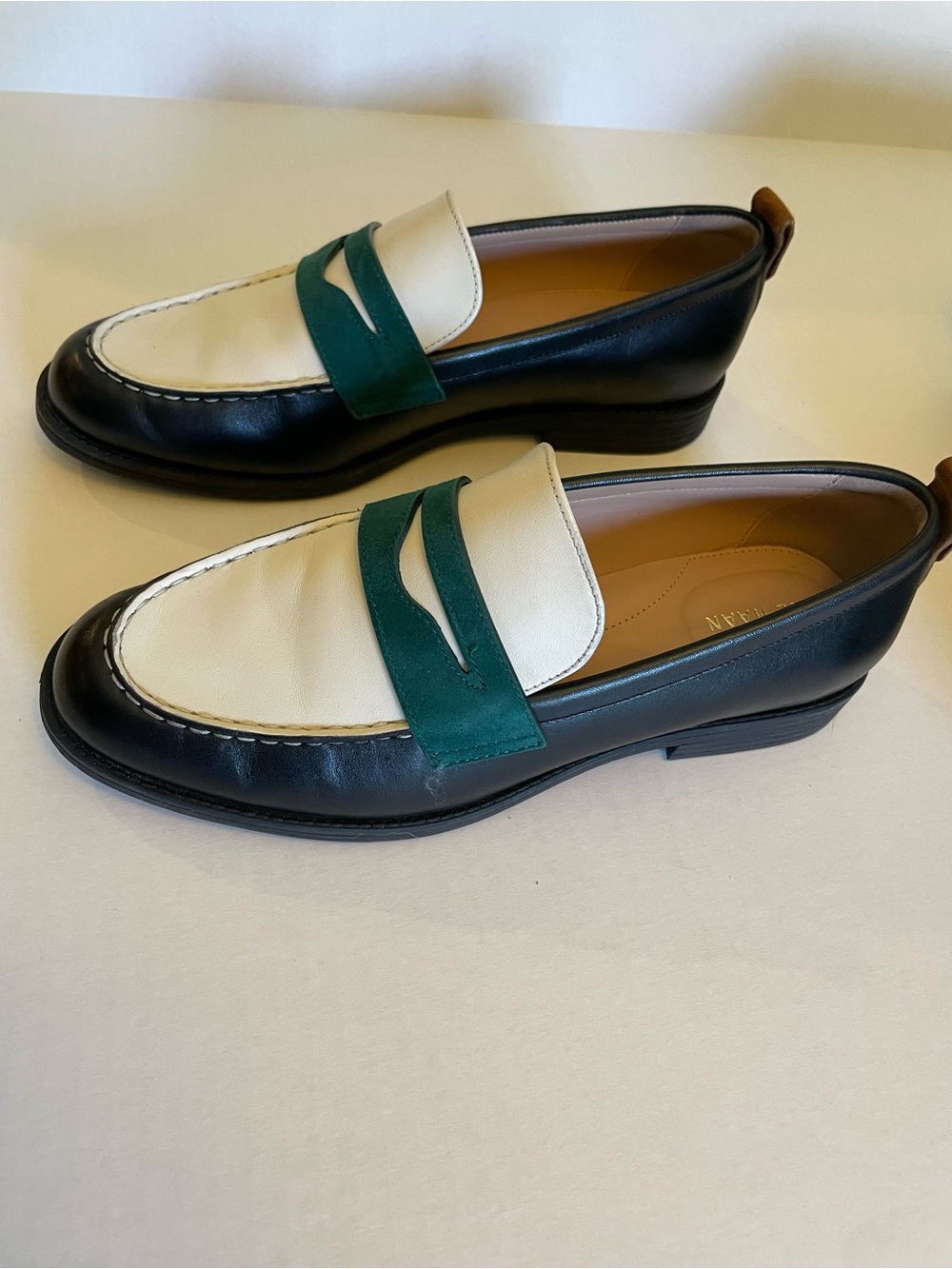Women’s Two-Tone Black and Cream Leather Penny Loafers with forest Accent